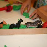 Play dough, animals, and tools