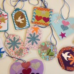 Laminated ornaments and charms