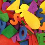 Colorful letter and shape collage