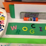 Foam letters, paper, and glue