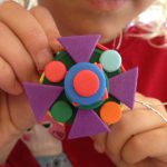 Necklaces with bottle tops and foam shapes